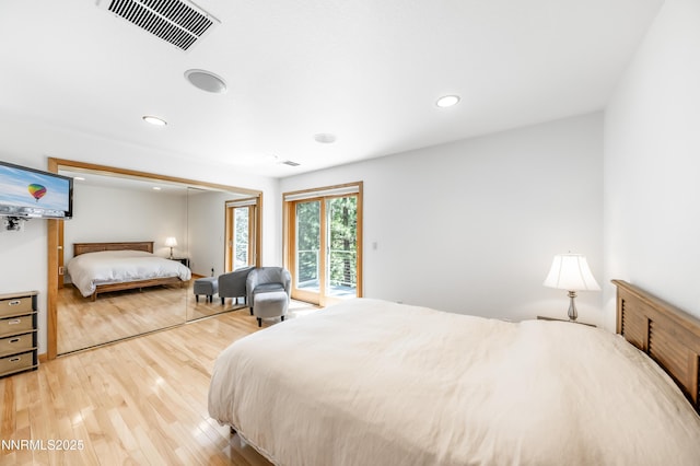 143 Granite Springs Dr, Stateline, NV 89449 - bedroom featuring access to outside, wood finished floors, and recessed lighting