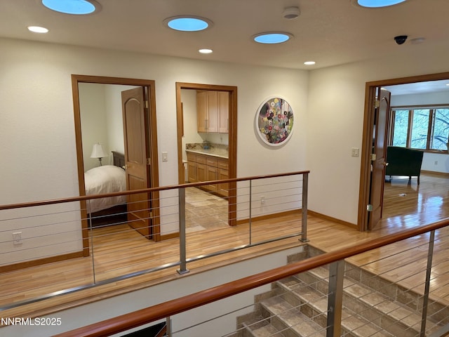 143 Granite Springs Dr, Stateline, NV 89449 - hall with an upstairs landing and recessed lighting