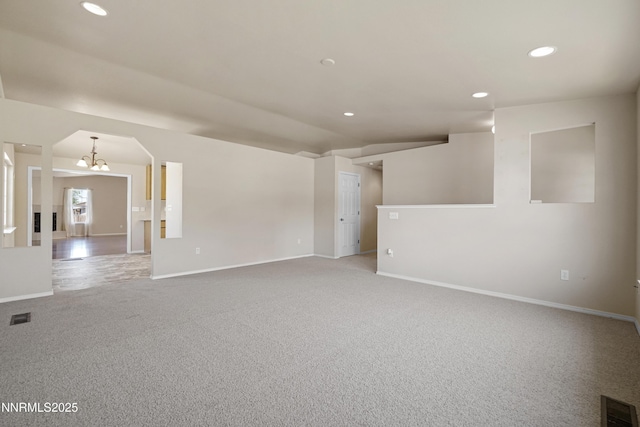 546 Yellow Jacket Rd, Dayton, NV 89403 - empty room with recessed lighting, baseboards, light carpet, and a chandelier