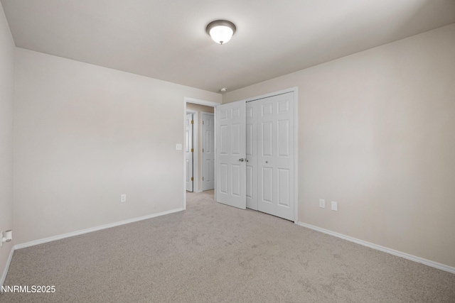 546 Yellow Jacket Rd, Dayton, NV 89403 - unfurnished bedroom featuring carpet, baseboards, and a closet