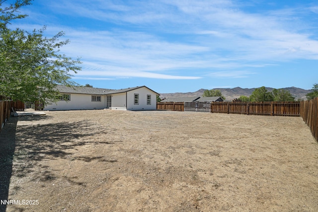 546 Yellow Jacket Rd, Dayton, NV 89403 - fenced backyard with a mountain view