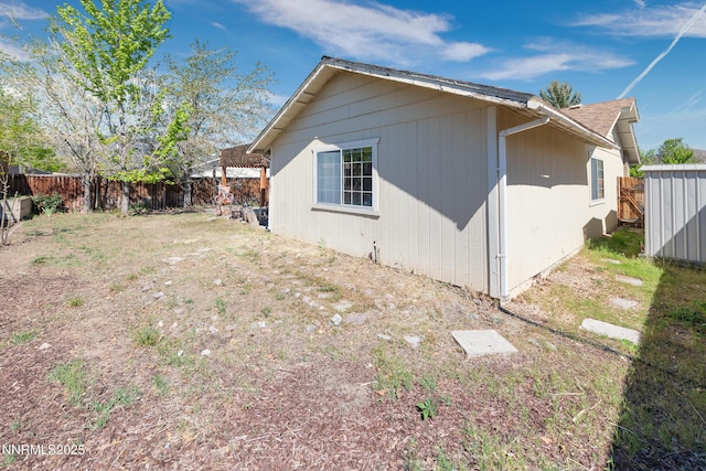 1667 Spooner Dr, Carson City, NV 89706 - view of side of property with a fenced backyard