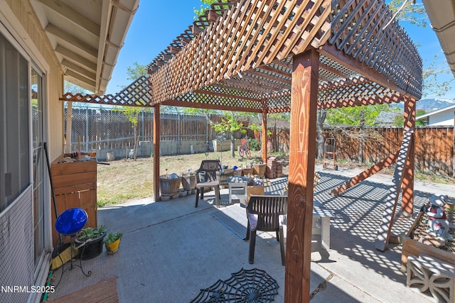 1667 Spooner Dr, Carson City, NV 89706 - fenced backyard featuring a patio, an outdoor living space, and a pergola