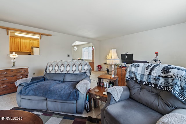 1667 Spooner Dr, Carson City, NV 89706 - carpeted living room with arched walkways