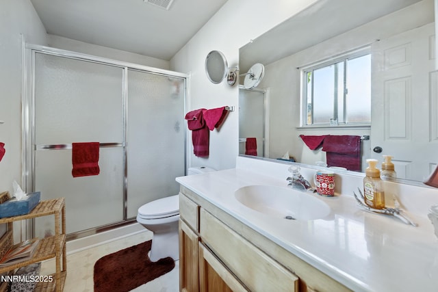 1667 Spooner Dr, Carson City, NV 89706 - bathroom with vanity, toilet, and a stall shower