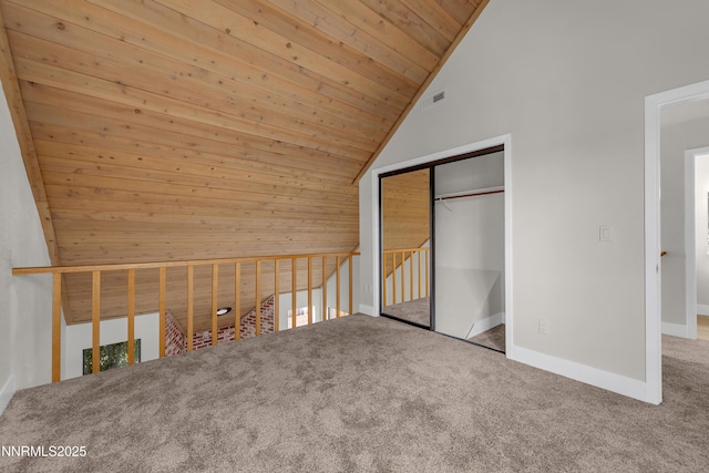 2501 Garfield Ct, Sparks, NV 89431 - unfurnished bedroom featuring lofted ceiling, wood ceiling, baseboards, carpet, and a closet