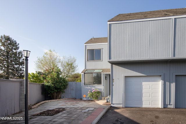 2501 Garfield Ct, Sparks, NV 89431 - view of front facade featuring a garage and a shingled roof