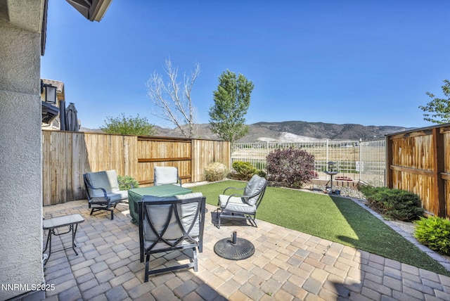 1940 Dark Horse Rd Unit C, Reno, NV 89521 - fenced backyard with a patio and a mountain view