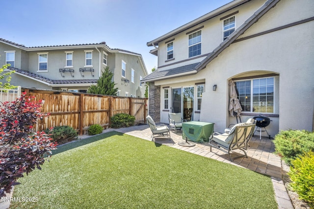 1940 Dark Horse Rd Unit C, Reno, NV 89521 - rear view of property featuring stucco siding and a patio area