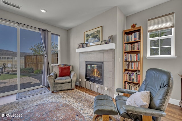 1940 Dark Horse Rd Unit C, Reno, NV 89521 - living area featuring wood finished floors, a fireplace, baseboards, and recessed lighting