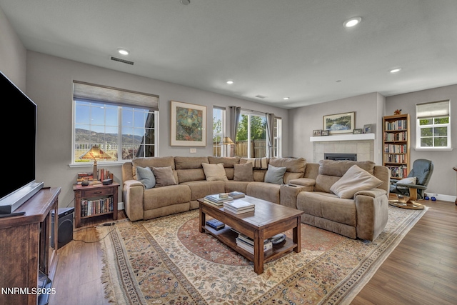 1940 Dark Horse Rd Unit C, Reno, NV 89521 - living area with a tile fireplace, recessed lighting, wood finished floors, and baseboards