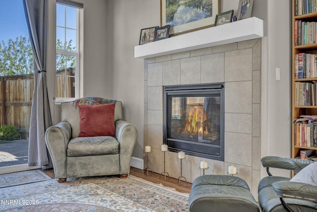 1940 Dark Horse Rd Unit C, Reno, NV 89521 - living area featuring wood finished floors and a tile fireplace