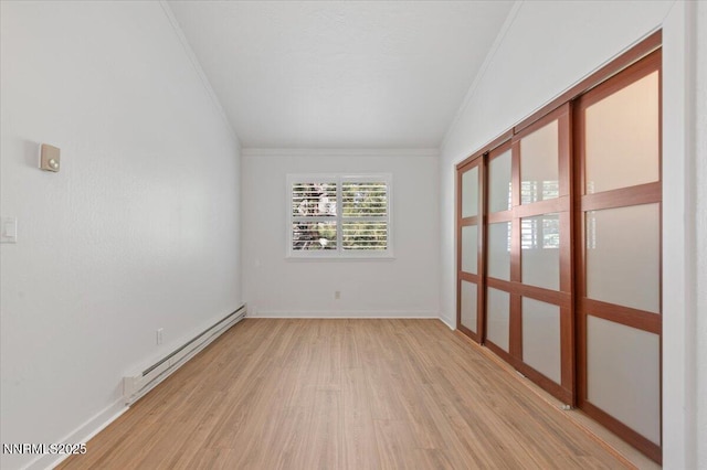 807 Alder Ave Unit 10, Incline Village, NV 89451 - empty room featuring baseboard heating, crown molding, and light wood-type flooring