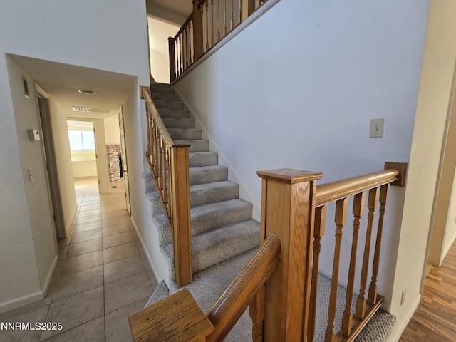 986 Quail Hollow Dr, Reno, NV 89511 - stairs with baseboards and tile patterned floors