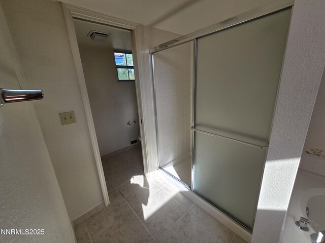 986 Quail Hollow Dr, Reno, NV 89511 - bathroom with a stall shower and tile patterned flooring