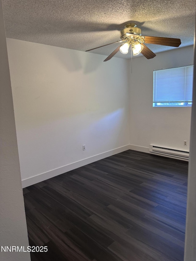 528 Smithridge Park, Reno, NV 89502 - unfurnished room featuring a baseboard heating unit, dark wood-style floors, a textured ceiling, baseboards, and a ceiling fan