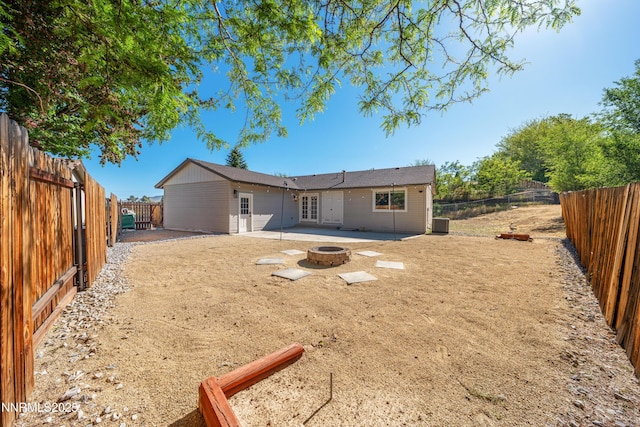 583 Marta Way, Reno, NV 89503 - rear view of house featuring an outdoor fire pit, a patio, a fenced backyard, and central air condition unit