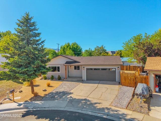 583 Marta Way, Reno, NV 89503 - ranch-style home featuring a garage, concrete driveway, and a shingled roof