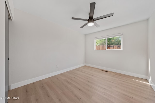 583 Marta Way, Reno, NV 89503 - empty room with light wood finished floors, baseboards, and a ceiling fan