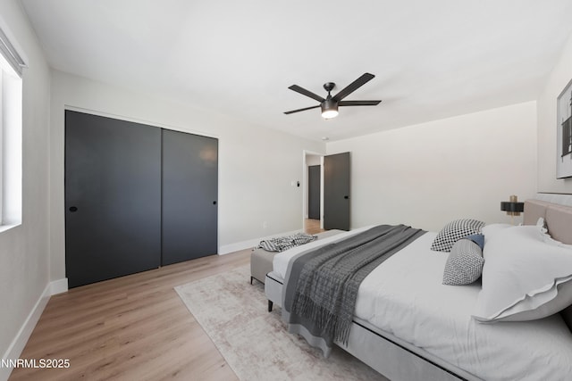 583 Marta Way, Reno, NV 89503 - bedroom featuring a closet, light wood-style floors, ceiling fan, and baseboards