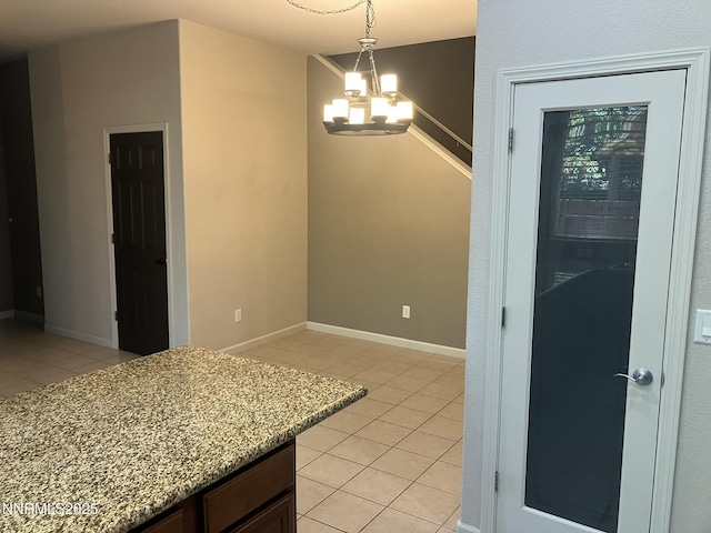 5619 Crescent Hill Way, Sparks, NV 89436 - dining space featuring light tile patterned flooring and a chandelier