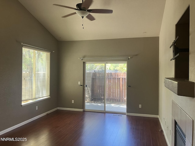 5619 Crescent Hill Way, Sparks, NV 89436 - unfurnished living room featuring ceiling fan, lofted ceiling, wood finished floors, and baseboards