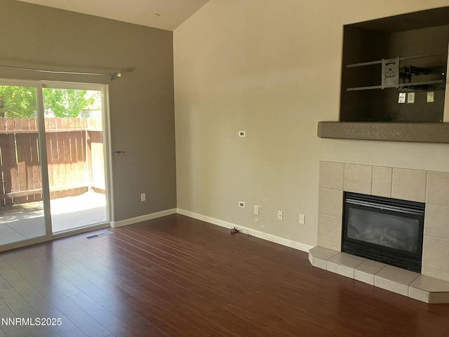 5619 Crescent Hill Way, Sparks, NV 89436 - unfurnished living room with dark wood-type flooring, baseboards, and a fireplace