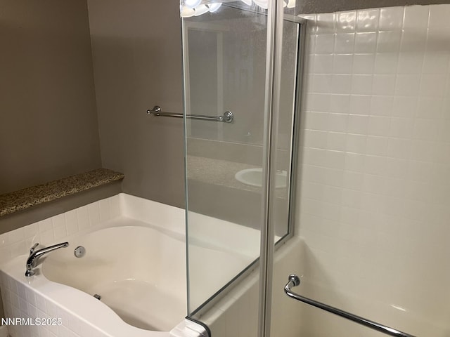 5619 Crescent Hill Way, Sparks, NV 89436 - bathroom with a stall shower and a bath