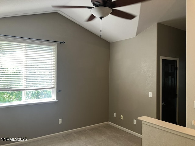 5619 Crescent Hill Way, Sparks, NV 89436 - unfurnished room with a ceiling fan, lofted ceiling, light carpet, and baseboards