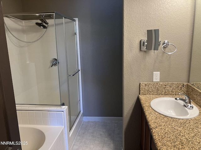 5619 Crescent Hill Way, Sparks, NV 89436 - full bath with a stall shower, vanity, baseboards, a tub to relax in, and tile patterned floors