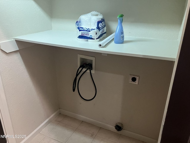 5619 Crescent Hill Way, Sparks, NV 89436 - laundry area featuring washer hookup, hookup for an electric dryer, light tile patterned floors, and baseboards