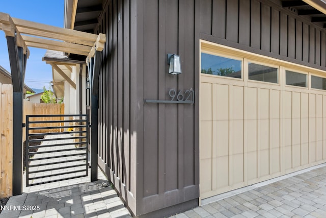 9621 Lane Garrett Dr, Reno, NV 89511 - property entrance featuring board and batten siding