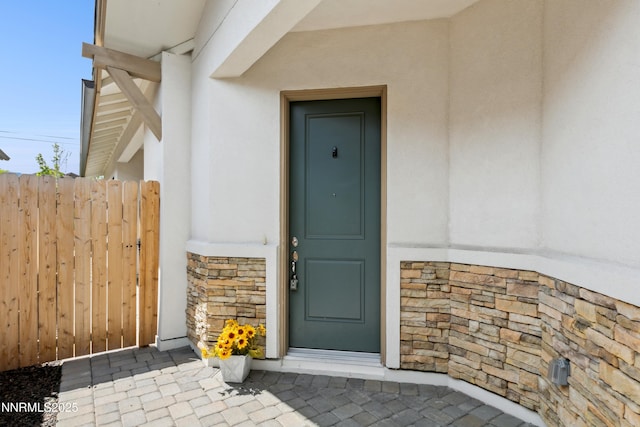 9621 Lane Garrett Dr, Reno, NV 89511 - entrance to property featuring stucco siding and stone siding