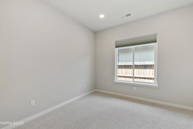 9621 Lane Garrett Dr, Reno, NV 89511 - unfurnished room featuring baseboards, light carpet, and recessed lighting