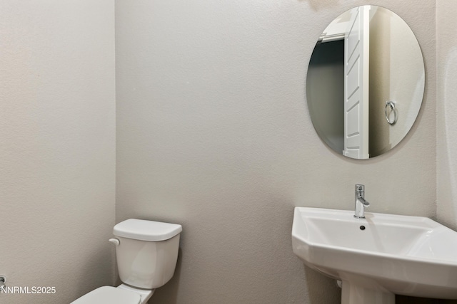 9621 Lane Garrett Dr, Reno, NV 89511 - bathroom with a sink and toilet