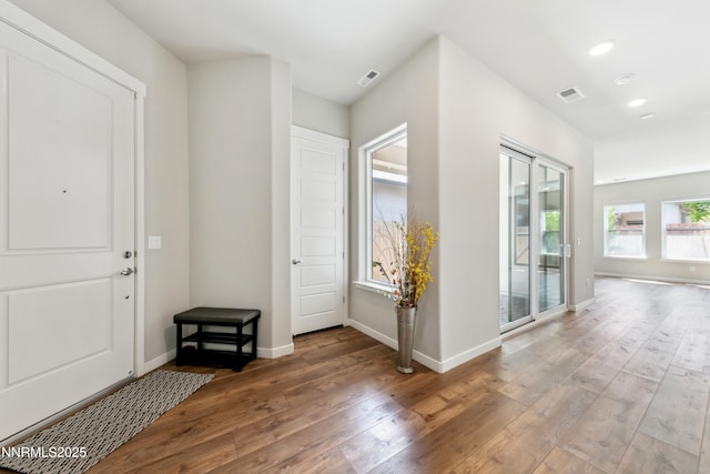 9621 Lane Garrett Dr, Reno, NV 89511 - entrance foyer with hardwood / wood-style flooring, baseboards, and recessed lighting