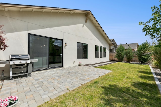 9621 Lane Garrett Dr, Reno, NV 89511 - rear view of property featuring a patio area and stucco siding