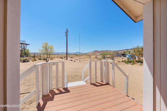 1260 Badger St, Silver Springs, NV 89429 - wooden terrace featuring a mountain view