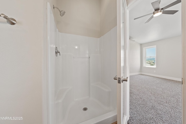 1260 Badger St, Silver Springs, NV 89429 - bathroom featuring a shower, baseboards, and a ceiling fan
