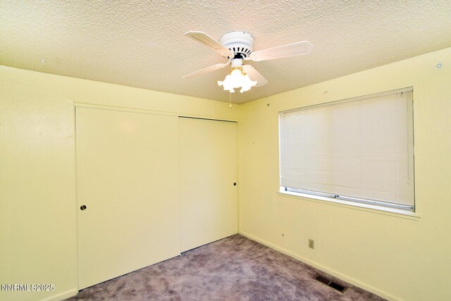 1664 Shadow Wood Rd, Reno, NV 89523 - unfurnished bedroom with a closet, carpet floors, a ceiling fan, and a textured ceiling