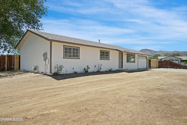 266 River Boat Rd, Dayton, NV 89403 - ranch-style home featuring an attached garage and a mountain view