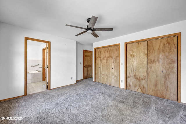 670 Valle Verde Dr, Sparks, NV 89441 - unfurnished bedroom featuring multiple closets, carpet, ensuite bath, baseboards, and ceiling fan