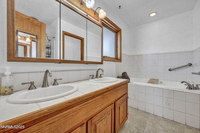 670 Valle Verde Dr, Sparks, NV 89441 - bathroom featuring a garden tub, double vanity, and tile patterned floors