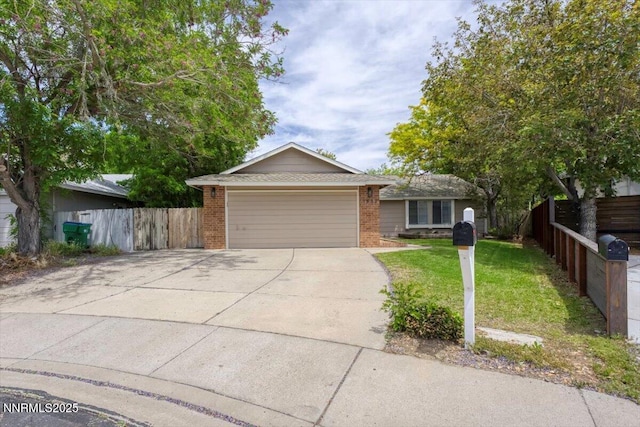 1832 Espee Ct, Sparks, NV 89434 - ranch-style house with brick siding, concrete driveway, and a garage
