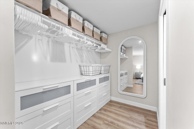 1832 Espee Ct, Sparks, NV 89434 - walk in closet with light wood finished floors and arched walkways