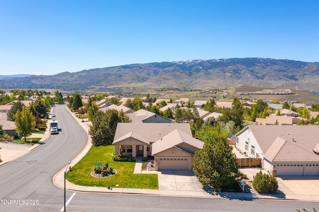 7100 Heatherwood Dr, Reno, NV 89523 - aerial view of residential area with a mountain backdrop