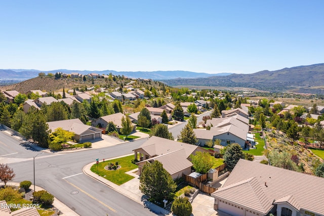 7100 Heatherwood Dr, Reno, NV 89523 - aerial perspective of suburban area with a mountainous background