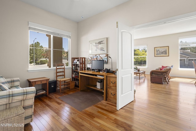 7100 Heatherwood Dr, Reno, NV 89523 - office with hardwood / wood-style flooring and healthy amount of natural light