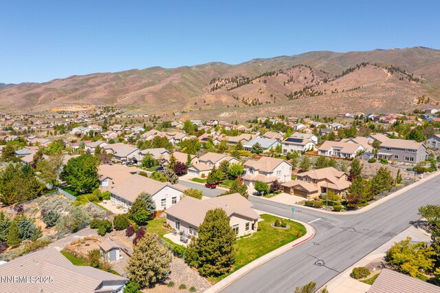 7100 Heatherwood Dr, Reno, NV 89523 - aerial perspective of suburban area featuring a mountain backdrop