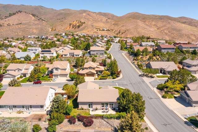 7100 Heatherwood Dr, Reno, NV 89523 - aerial perspective of suburban area with a mountainous background